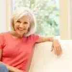 middle aged woman relaxing at home