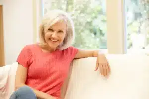 middle aged woman relaxing at home