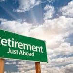 A road sign with the words Retirement Just Ahead